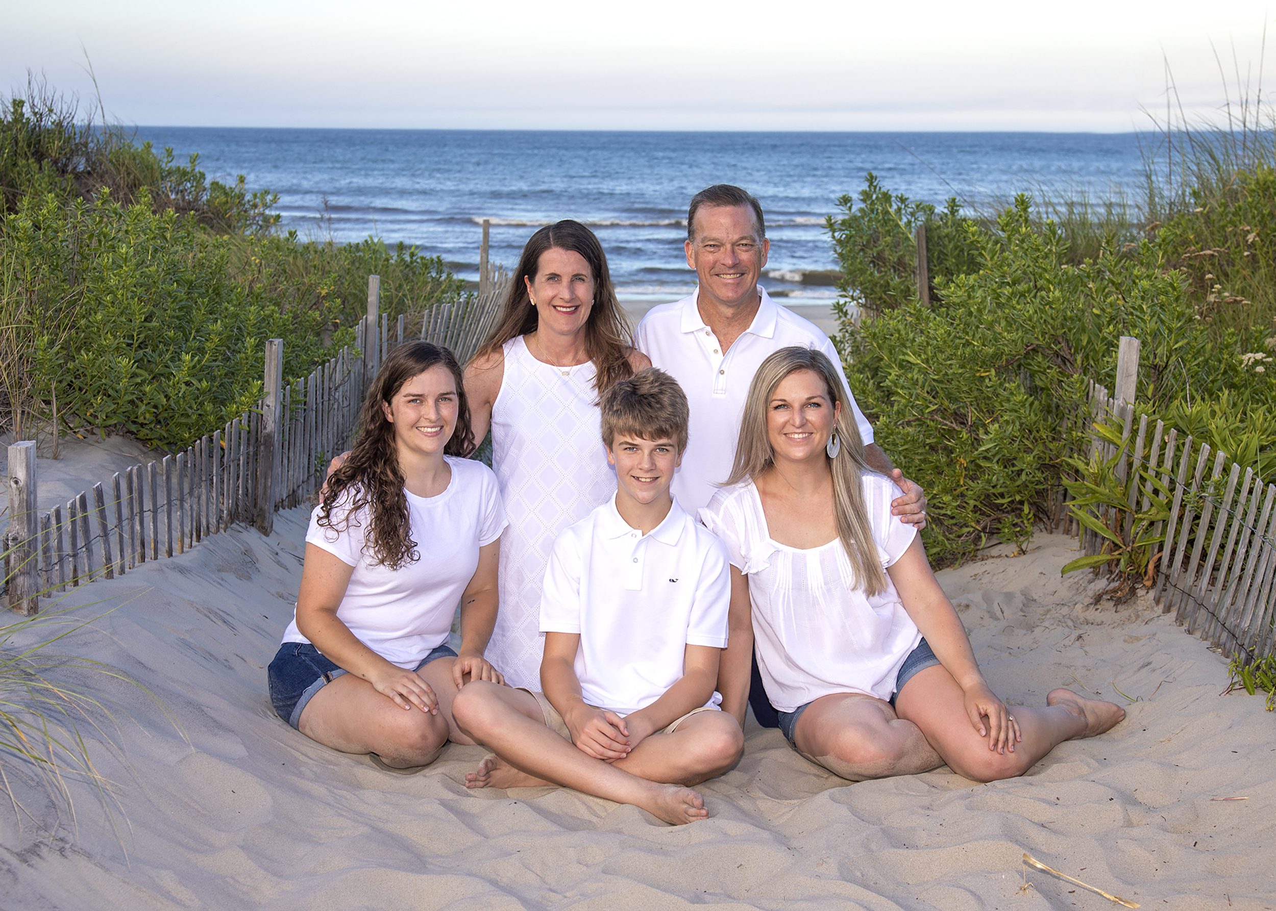 a family portrait on the beach in Corolla NC