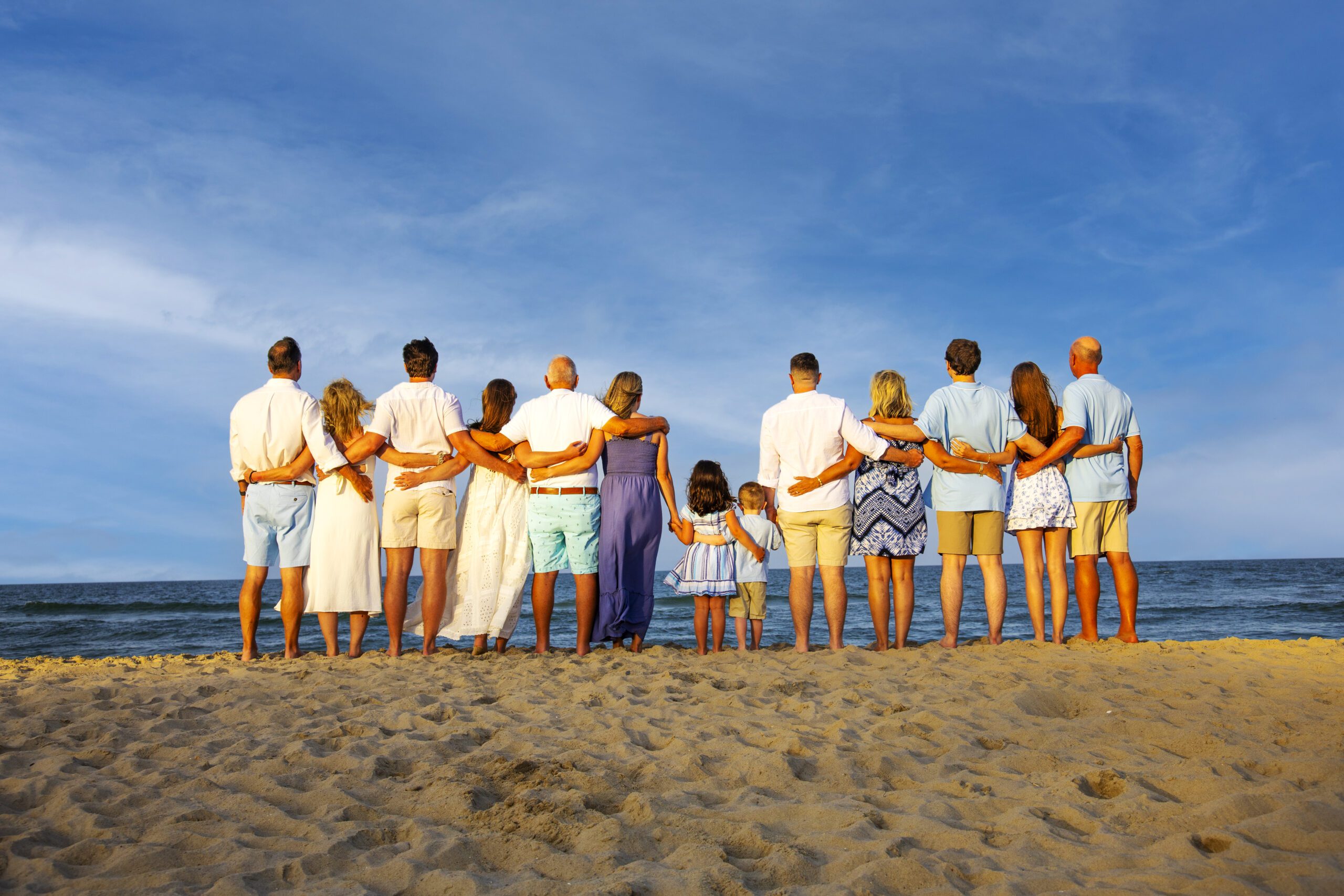 Emotional multi generational family portrait at sunset Outer Banks NC
